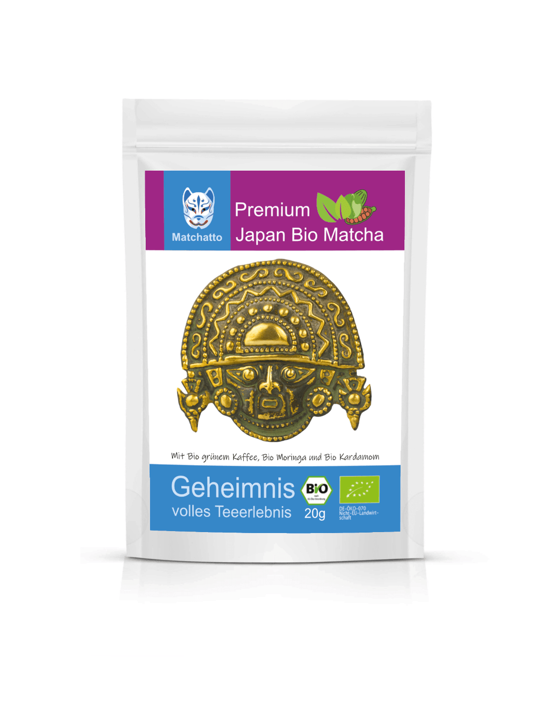 Matchatto Geheimnis Bio Matcha mit grünem Kaffee, Moringa und Kardamom – 20 g Packung mit goldener Maske als Etikettendesign.
