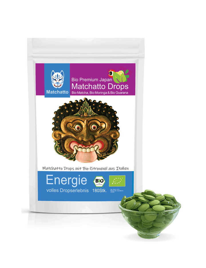 Matchatto Drops Energie mit Bio Matcha, Moringa, Guarana und Bio-Zitronenöl – Packung mit kunstvoller Maske und grünen Presslingen in Glasschale, 180 Stück.